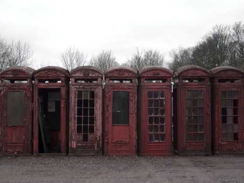 ruinationstation:UK’s red telephone box graveyard - Carlton Miniott