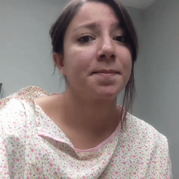 gynie-ville: At the gynecologist for her well woman exam, her expressions shows how she feels about 