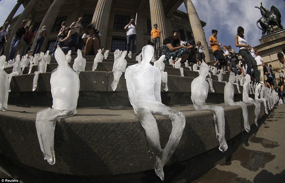 sixpenceee:  A thousand miniature people have slowly melted away in a Berlin square
