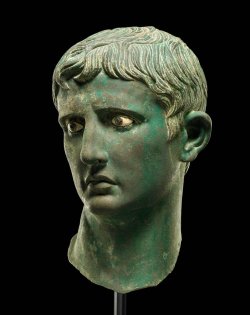 reumar:  Perfectly Chaotic   Bronze head of Augustus   Date Created: -27 Location: Meroe, Sudan Physical Dimensions: 46.2 x 26.5 x 29.4 cm Registration number: 1911,0901.1 Material: bronze, calcite, glass and plaster Copyright: The Trustees of the British