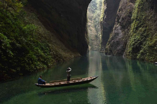 Valley in Ping Mountain屏山, Hefeng county鹤峰县, China. The water there is so clear that the boat is lik