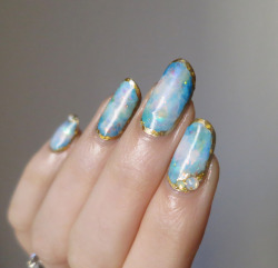 ladycrappo:  Some more opal nails inspired by @basecoat-topcoat. 