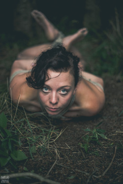 fetlab: Bound blue-eyed girl in the woods.