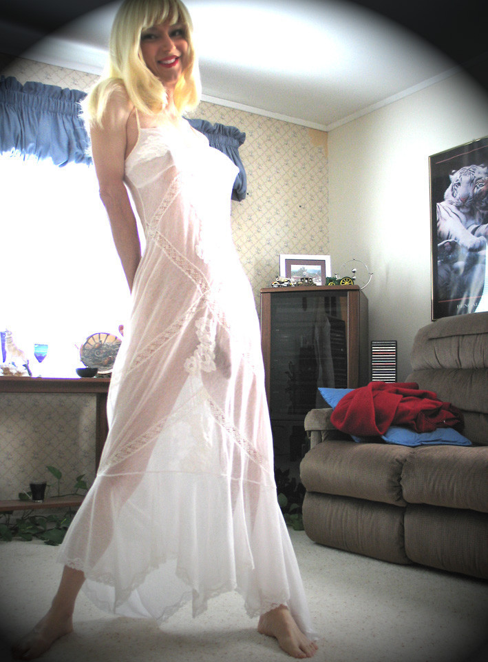 sturgisboi69:mmmm…. love what I see under the sheer dress…tgirl of the day!
