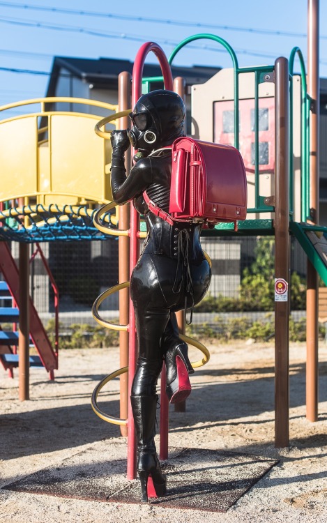 Black Rubber Latex Catsuit with Red Randoseru in Public