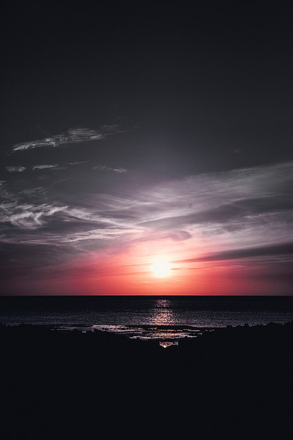 atraversso:  Sunset at Sharks Cove Hawaii by D.Mance on Flickr.