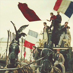 the-leader-in-red:I like how Grantaire’s the only one sitting and he’s beside the coachman as if to 