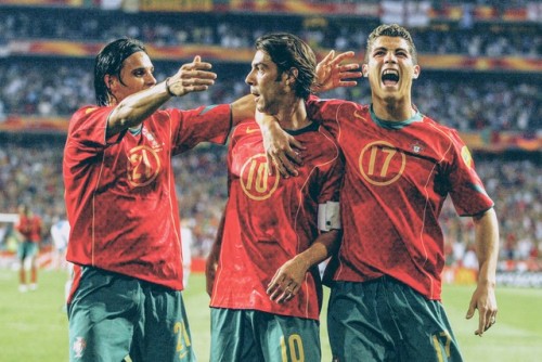 Rui Costa is joined in celebration by fellow teammates Nuno Gomes and Cristiano Ronaldo after scoring a goal for Portugal during the 2004 UEFA European Championships held in Greece.