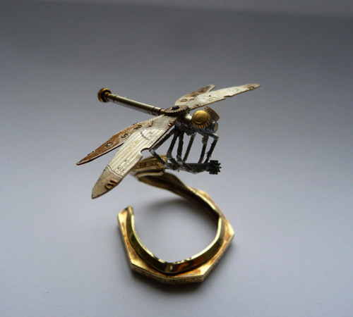 archiemcphee:  Chicago-based artist Justin Gershenson-Gates, of A Mechanical Mind, uses the insides of old watches to create awesome little clockwork creatures and beautiful pieces of jewelry.  “As a child, I would take my toys apart in order to