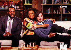 thewalkinggifs:  Norman Reedus showing off his socks on Talking Dead (*by request)