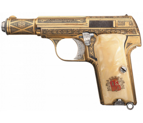 Extraordinary gold damascened Astra 300 pistol with pearl grips.Sold at Auction: $7,000