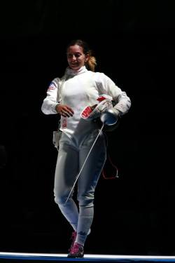 modernfencing:  [ID: an epee fencer walking off strip and smiling.]Rossella Fiamingo, at the 2015 World Championships after winning the women’s epee final! 