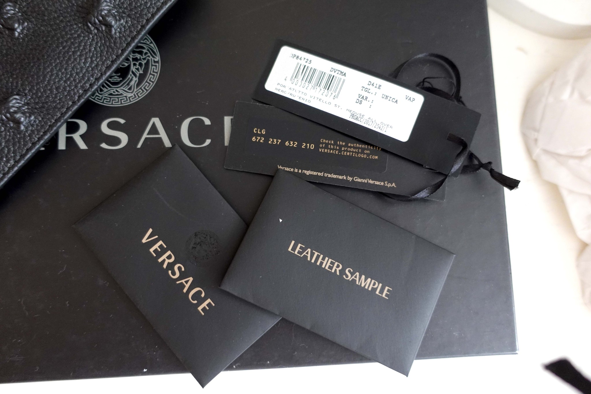 Brand new VERSACE black leather embossed LOGO clutch bag envelope