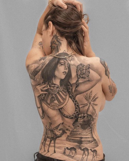 Amazing cleopatra back Egyptian pyramids camels tattoo by Matias Noble @matiasnobletattoo from @nobl