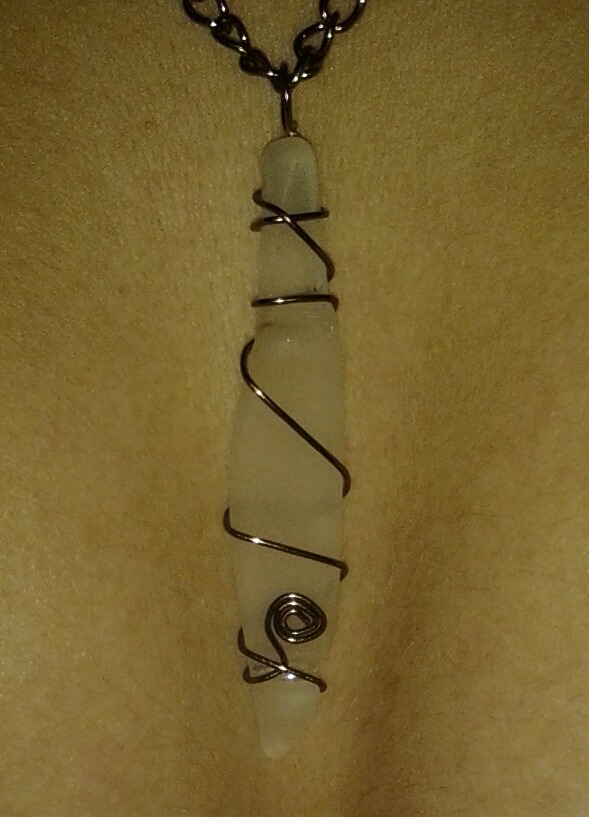 A beautiful sea glass necklace w a bronze chain and wiring I bought from some lovely