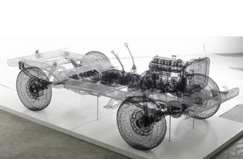 Artist Shi Jindian 师进滇 creates wire sculptures of transportation vehicles by wrapping