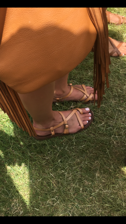 Nice Greek styled leather sandals on pretty feet.
