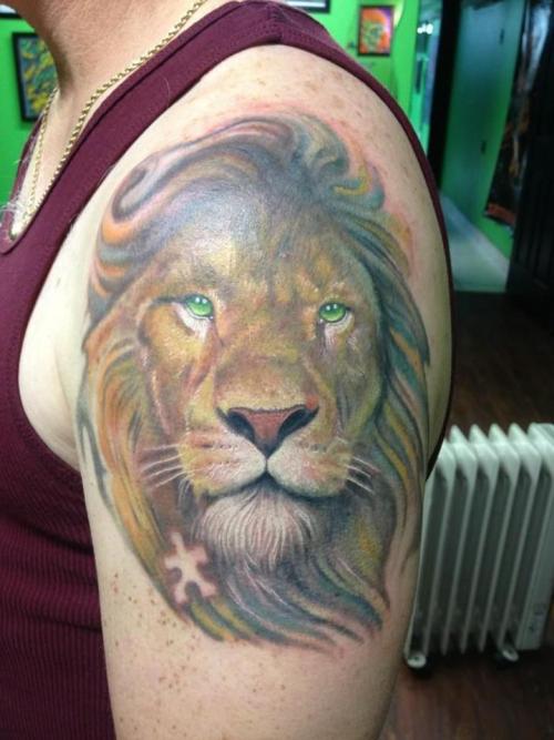 fuckyeahtattoos:  Lion by Steve Monie of Pinz and Needlez Tattoo Studio in Edgewood, MD www.pinzandneedleztattoo.com www.tattoomoney.com 