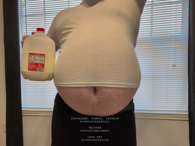 bigwolfcakebelly:Never knew my gut made a whole gallon look so… tiny. 😅 Guess it makes sense that I can chug it all, then.Support me on Patreon to get this belly growing even bigger. 😏