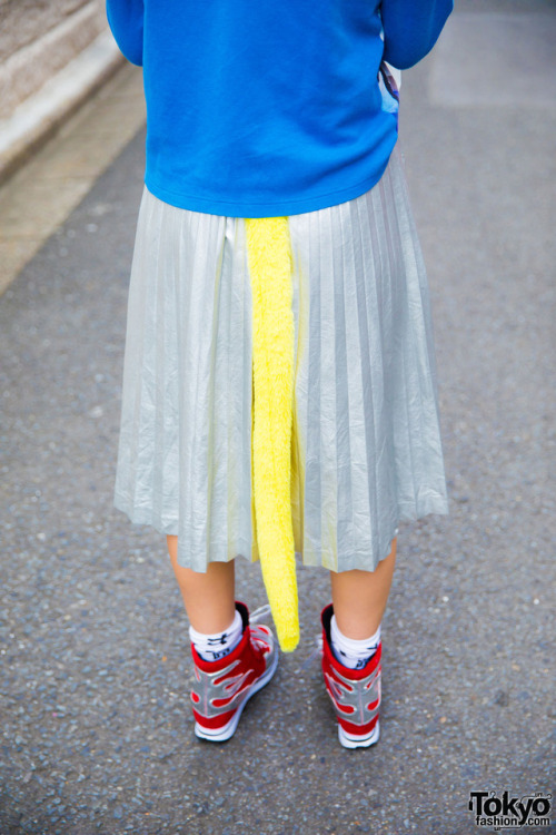 tokyo-fashion:  14-year-old Nanase’s Pokemon themed look on the street in Harajuku with a resale Pocket Monsters sweatshirt from Kinji, a silver pleated midi skirt, platform sneakers, kawaii accessories, and a plush tail. Full Look