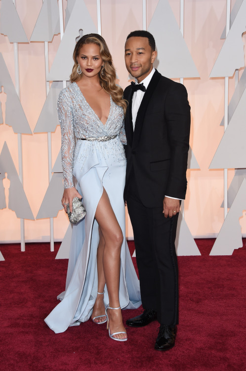 celebritiesofcolor:Chrissy Teigen and John Legend attend the 87th Annual Academy Awards at Hollywood