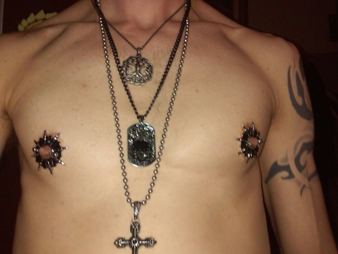 nippladdiction:  slim7-5:  Enjoying my latest upgrade. Nipple piercings are very