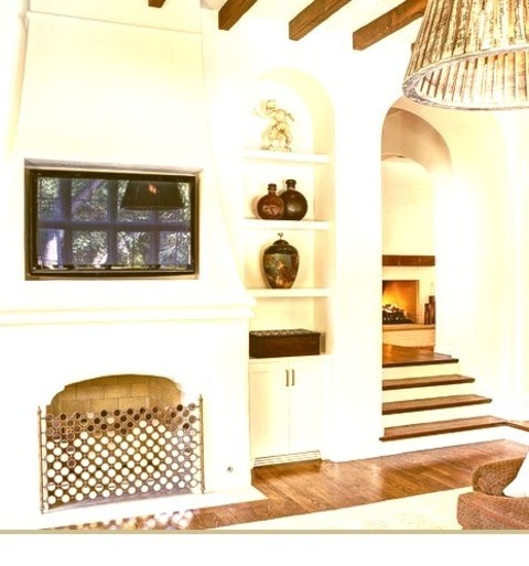 Mediterranean Family Room In DallasInspiration For A Large Mediterranean Open Concept Medium Tone Wood