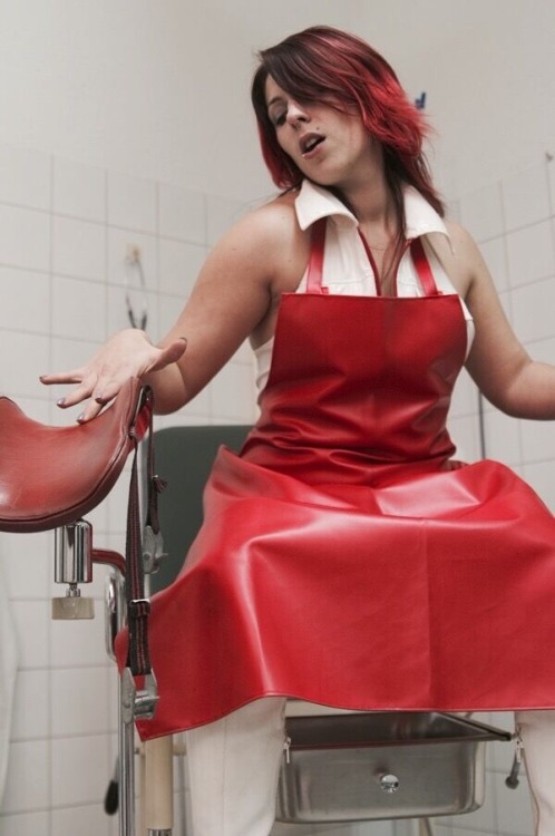 pvcapronlover: Sexy nurse with red pvc apron