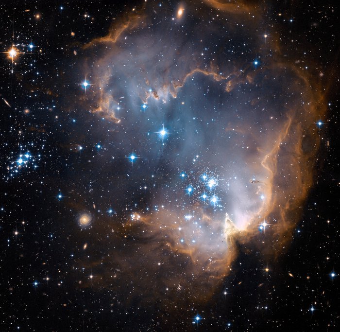 science-junkie:  Star-forming Nebula N90 Credit: NASA, ESA, Hubble Heritage Team.