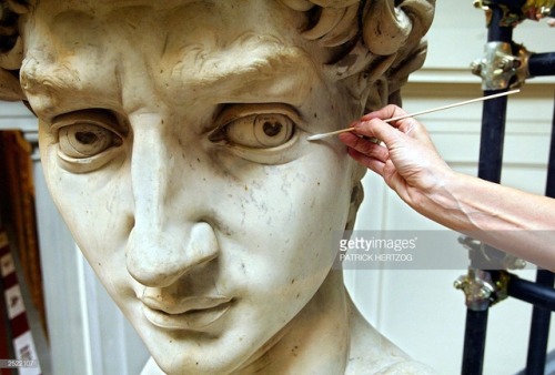 Italian restorer Cinzia Parnigoni cleaning Michelangelo&rsquo;s David (1501-1504).