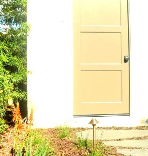 Los Angeles Flower BedPhoto Of A Large Partial Sun And Drought-tolerant Backyard Stone Flower Bed.