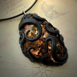 cthulhu-jewellery:  Tentacled Faux Amber Necklacehttp://www.cthulhujewellery.com