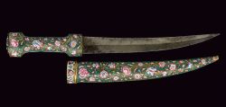 art-of-swords:  Khanjar DaggerDated: late 18th centuryCulture: IndopersianMeasurements: overall length 40.5cmThe dagger has a curved, double-edged damask blade ribbed at the centre. The brass grip is entirely decorated with enamelled floral motifs on