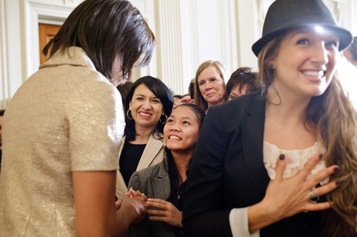 First Lady Michelle Obama greets guests during the International Women’s Day reception in the 