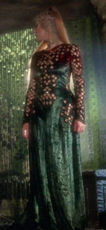 costumeloverz71: Morgana (Helen Mirren) Red cutout dress… Excalibur (1981).. Costume by Bob Ringwood