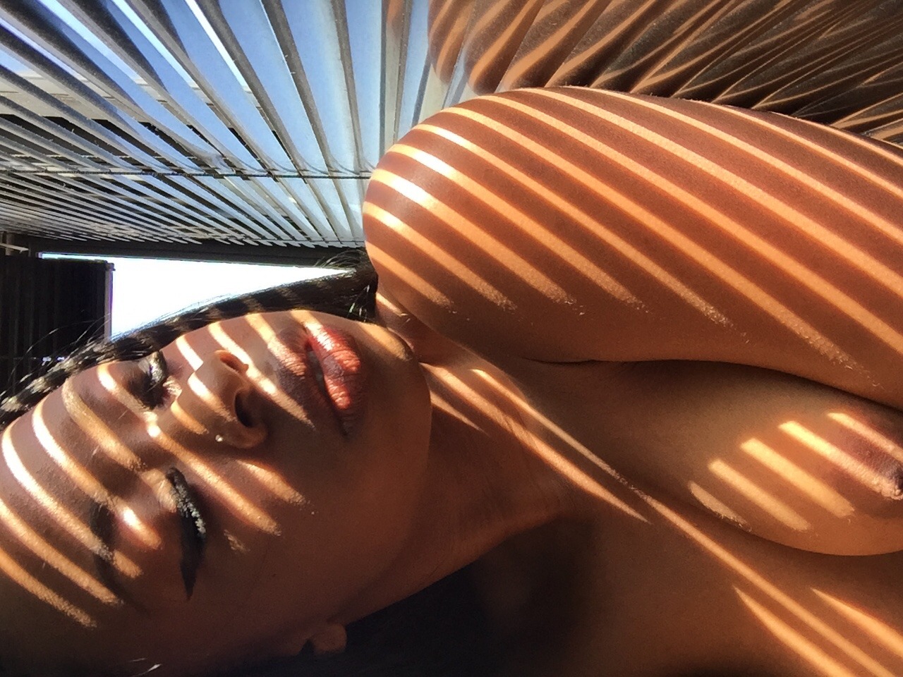 lameilleurrr:  Self taken pics with the light seeping thru the blinds I loved the
