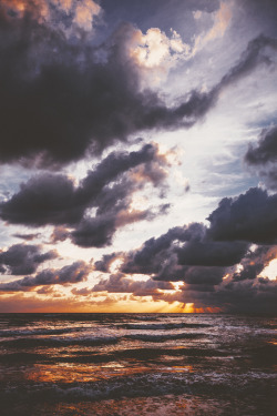 elenamorelli:  { dark clouds, orange light