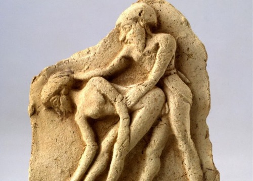 Sexual intercourse between a woman and a man on a terra cotta plaques from Mesopotamia, early 2nd mi