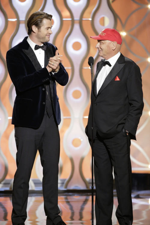 Presenters Chris Hemsworth and Niki Lauda speak onstage during the 71st Annual Golden Globe Award at