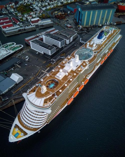 Floating city….P&O Cruises’ massive new cruise ship MS [motor ship] Iona dwarfs the pier,