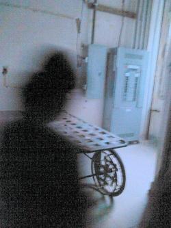 terrifiantus:   This is a picture that was submitted to my high school newspapers team for a story regarding local haunts. A person actually caught this two days before the story came out. It was taken at waverly hills sanatorium, an old TB hospital.