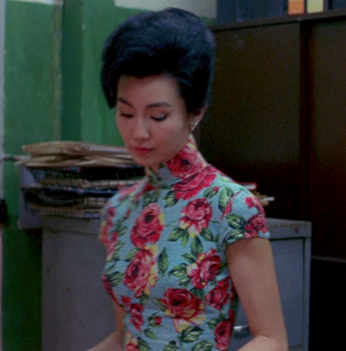 hoanbee:  Maggie Cheung wears a different cheongsam (qipao) dress in each scene of Wong Kar-Wai’s In the Mood For Love. There were 46 in all, though not all made it to the final cut. 