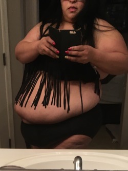 bigbellybabe-b3:  It’s official I’m huge! I decided I would try on last seasons bathing suit to see if it would fit. And it does and doesn’t. The waistband was stretched to capacity and digging painfully into my sides. I had belly spilling everywhere