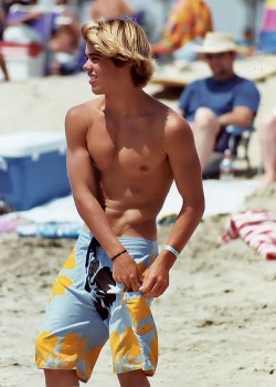 itsswimfever:  Shaggy haired blond beachboy…