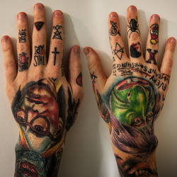 tattoos:  Left hand Nikko Hurtado - Right