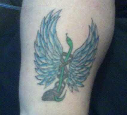 My Hermes wing done by Mike at Great Southern Tattoo Company in...