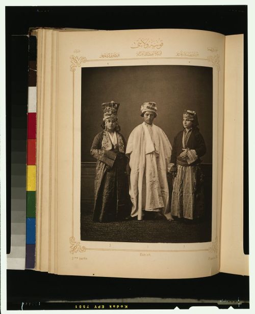 Studio portraits of models wearing traditional clothing from theOttoman province of Koniah, also kno