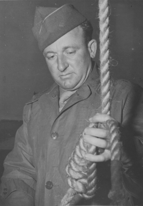 U.S. Master Sergeant John Woods preparing a noose for one sentenced at Nuremberg. Woods carried out 