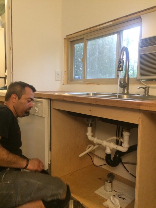 Getting the dishwasher and kitchen sink installed!! #containerhouse #shippingcontainer