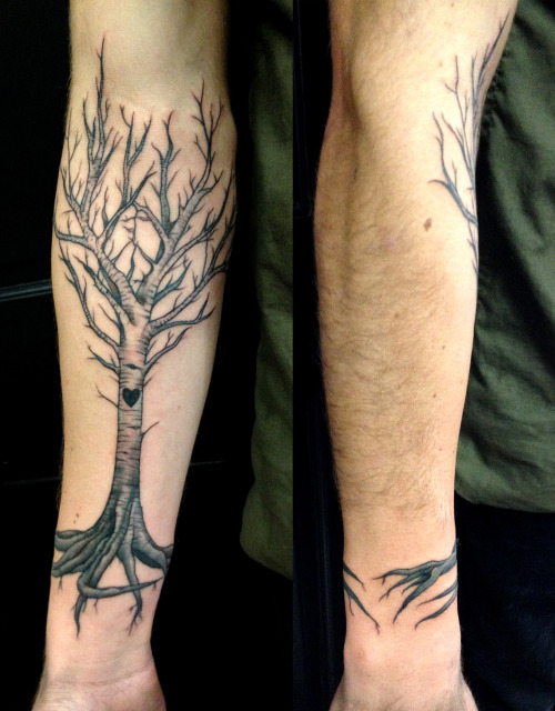 fuckyeahtattoos:Freehand black ‘n opaque grey tree- Peace, Love, and Anarchy!Tattoo by Jopie Lee a